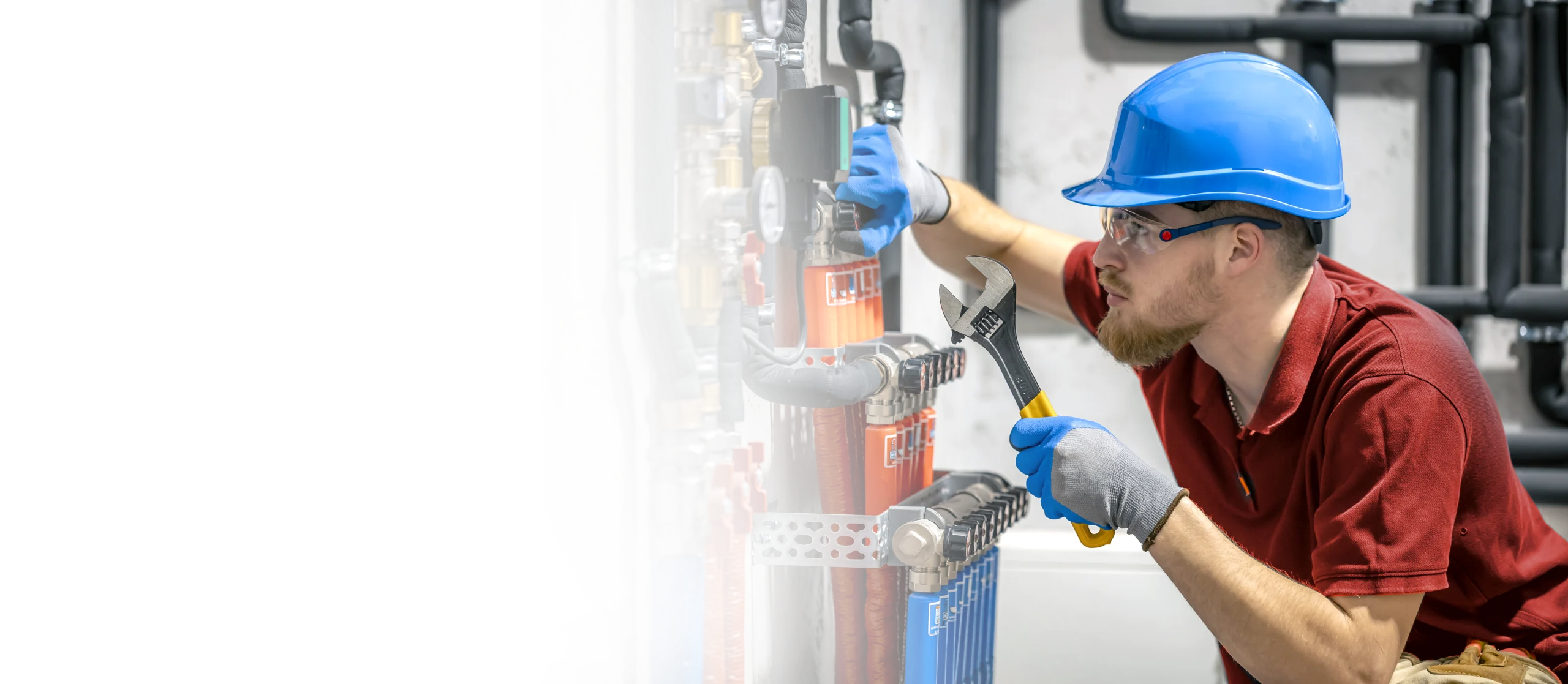 AIC technician performing whole-home humidifier maintenance in a Calgary home