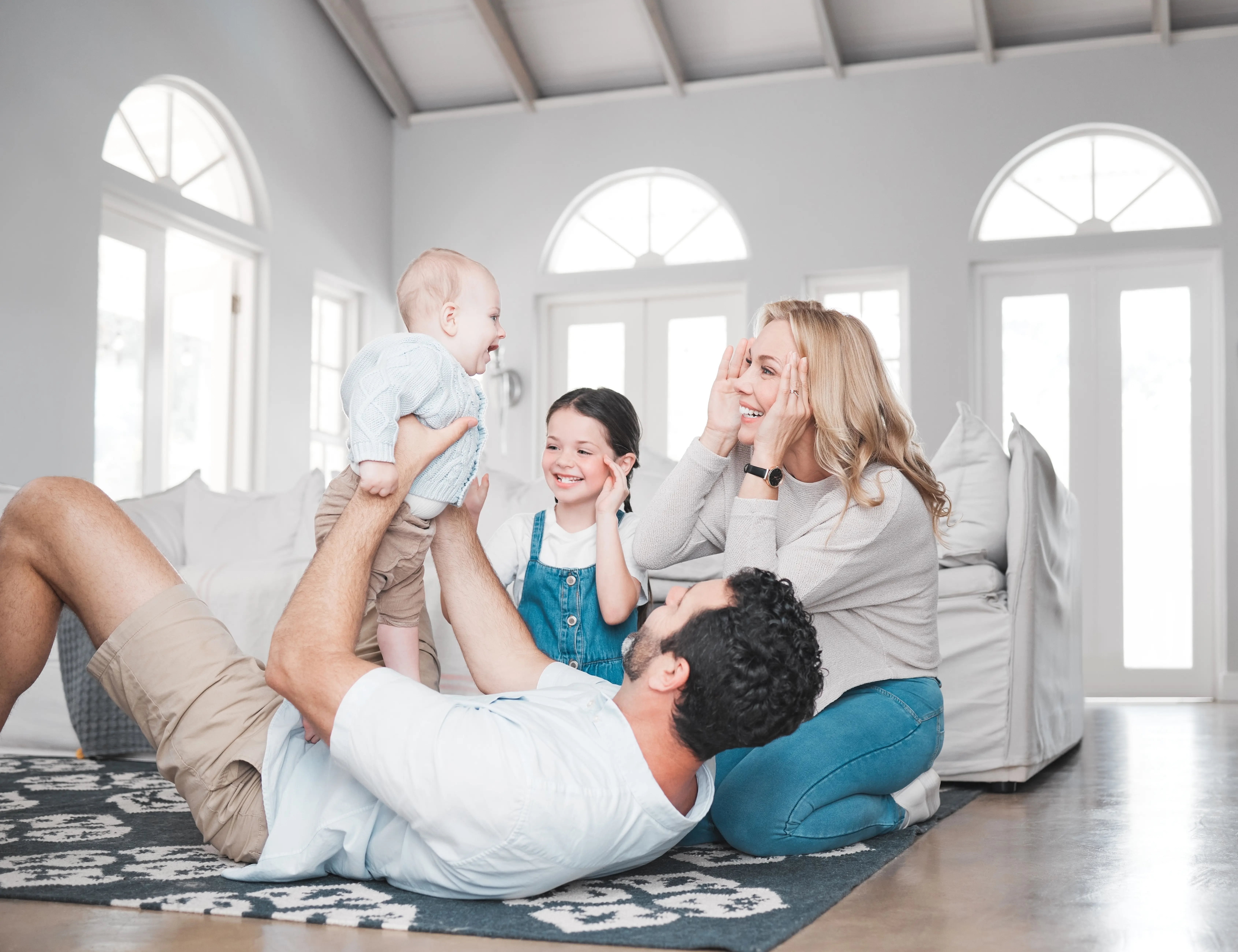 Happy Calgary family warm and comfortable after a new boiler system installation